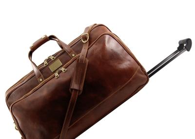Ruda Unisex odinis kelionių lagaminas  Natūralios odos odinis prabangus brangus  prabangus kelionių lagaminas iš odos. Brangi dovana žmonai, direktorei, verslininkei, vadovei, viršininkiai.