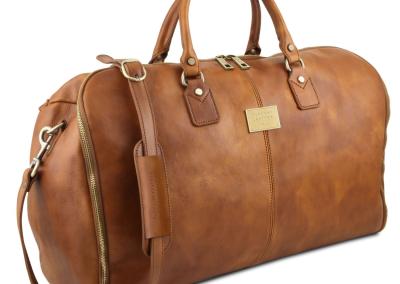Ruda Unisex odinis kostiumų dėklas krepšys vyrams ir moterims Natūralios odos odinis prabangus brangus  prabangus verslo krepšys kostiumams iš odos, puikiai tiks komandiruotėms, kelionėms, atostogoms. Brangi verslo dovana verslo partneriams, direktorei, verslininkei, vadovei, viršininkiai.